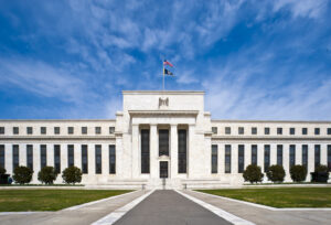 Federal Reserve policy outlook influences US dollar strength and market expectations after strong employment data.